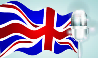Grafika przedstawiająca flagę Wielkiej Brytanii z mikrofonem